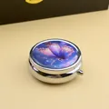 Portable silver metal round pill box with artistic purple butterfly pattern on top - Round / Purple Butterfly