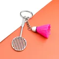 Badminton racket keychain with a bright pink shuttlecock and silver metal finish - Badminton Racket With Rose Red Shuttlecock / Rose Red
