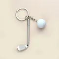 Detail of silver golf club and white ball keychain with realistic dimple texture and ring - Golf Ball and Club Style (A-073 Golf White Ball)