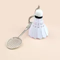 Silver metal badminton racket and white shuttlecock keychain on a neutral background - Basic Style / White
