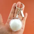 Acryl-Tischtennis-Schlüsselanhänger mit weißem Ball und gravierbarem Metallelement - Schüttelball-Stil mit Etikett