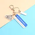Portachiavi con volano da badminton e targhetta in acrilico blu decorativa - Segnale Mi Manchi con Badminton e Targhetta Metallo