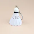 Portachiavi da badminton volano bianco con anello in metallo su sfondo rosa - Pendente Badminton Bianco Puro