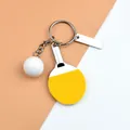 Creative table tennis keychain with yellow bat and white ball on a modern metal ring - Yellow Pendant With Metal Tag Style