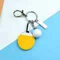 Ping pong paddle keychain with yellow rubber and white ball ornament - Yellow Lobster Clasp With Metal Tag Style