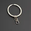 Silver metal keychain variant with a polished flat ring and rotating lobster clasp swivel - 32mm Flat Ring with Figure-8 Clasp / Nickel