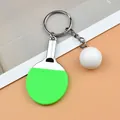 Mini table tennis racket keychain with green rubber finish and a small white ball - Green Standard Key Ring Style