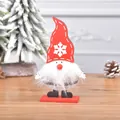 Red wooden Christmas gnome figurine with plush beard and snowflake patterned hat - Red Hat Gnome
