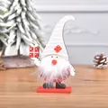 Christmas wooden gnome figure with striped hat and white beard on a festive wood base - Grey Hat Gnome Style