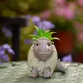 Creative resin dinosaur egg figurine with green leaves and realistic skin texture - Tietie Dinosaur (Gray)