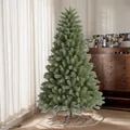 Üppiger 1,8m grüner PE Weihnachtsbaum mit Metallständer und weichem Baumrock im Wohnzimmer - 150cm