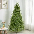 Close-up of dense green PE artificial Christmas tree with realistic pine needles - 150cm