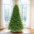 Lush green PE artificial Christmas tree with dense tiered branches for home decor - Small