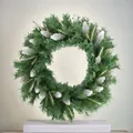 Artificial Christmas wreath with snowy pine cones and green needles for festive home decor - Small Snowy Wreath