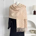 Plaid cashmere-feel scarf with tassels on black coat for 2025 autumn winter fashion - Diagonal Stripe Camel