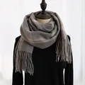 Close-up of grey houndstooth patterned scarf featuring soft fringe trim and thick cashmere feel - 190cm / Sweet Gray Plaid