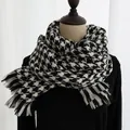 Classic black and white houndstooth scarf with fringe tassels on a fashion mannequin - Houndstooth Black
