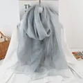 Detailed macro view of light blue pleated silk mesh shawl with sheer texture - 190x70 / Silver Grey