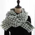 Close-up of houndstooth scarf with fine tassel details and soft woven texture - 190cm / Green Houndstooth