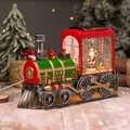 Green vintage Christmas train music box with glowing snow globe and Santa Claus figurine - Red Train Rotating Santa (A-53)