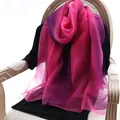 Gradient silk wool scarf in fuchsia and purple hues draped over a vintage chair - 190cm / Rose Red Gradient