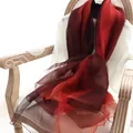 Long gradient silk wool scarf in deep burgundy to red shades for women on a chair - 190cm / Burgundy Gradient