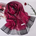 Luxurious burgundy 100% silk scarf featuring a golden mesh pattern and black gauze edge - Rose Red