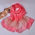 Elegant coral pink 100% silk scarf for women featuring a golden translucent border - Watermelon red