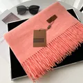 Thick coral pink cashmere-like winter scarf with fringe detail and leather label - Extended Version / Watermelon red