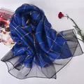 Royal blue silk scarf with gold grid pattern and black sheer mesh border trim - Sapphire Blue