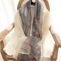 Classic grey, red, and blue plaid silk wool shawl elegantly draped on a vintage chair - 190cm / Beige