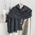 Elegant black and white plaid scarf with fringe on wooden hanger with beige coat - 190cm / Black