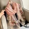 Close-up of pink silk wool scarf featuring intricate floral embroidery and sequins - 195cmx70cm / Pink