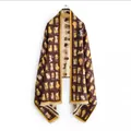 Deep brown cartoon cat pattern scarf with yellow edges and soft fringe details - Coffee