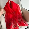 Close-up of elegant red silk wool shawl featuring intricate floral embroidery details - 195CM / Red
