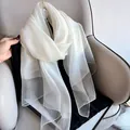 Close-up of elegant white silk wool shawl with shimmering pearlescent glitter effect - 195CM / White