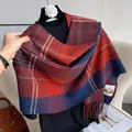 Detail of red and navy plaid scarf with soft fringe texture and white woven brand label - Red Blue Orange Scottish Plaid (Type G)