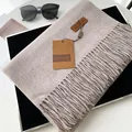 Solid color cashmere-like scarf in taupe with fringe trim and leather brand tag - Shrimp Color