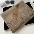 Deep camel cashmere-like scarf with fringe edges and premium leather brand logo - Flax Khaki