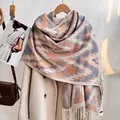 Detail of soft cashmere-like scarf with geometric wave patterns and fringe tassels - Pink