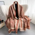 Detail of Greek Key pattern on cashmere-feel scarf with elegant fringe texture - 196cm / Brown