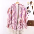 Ethnic knit scarf with pink gradient wave patterns and white tassels on a hanger - Rose Pink