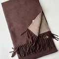Detail of double-sided wool scarf showing dark coffee color and oatmeal textured fringe - Coffee