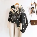 Elegant polka dot floral cashmere feel scarf in black and white with fringe edge - Black