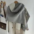 Gray and white double-sided wool blend scarf with fringe on a beige coat - Off-White