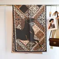 Close-up of jacquard horse pattern and tassel fringe on thick cashmere-like scarf - 185cm / Galloping Horse - Gray