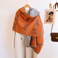 Double-sided jacquard horse pattern scarf with tassels in orange and grey tones - 185cm / Orange