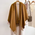 Close-up of caramel wool scarf with fringe detail styled on an off-white coat - 185cm / Dark Camel