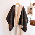 Detail of double-sided scarf with horse pattern and jacquard tassels for winter warmth - 185cm / Black