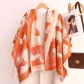 Luxurious cashmere-feel horse jacquard scarf in vibrant orange and cream white - Orange